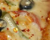 A picture of step 8 of Chicken tikka pizza without oven.