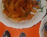 A picture of step 5 of Honey chilli garlic potatoes.