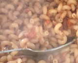 A picture of step 4 of Macaroni Jollof.