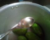 A picture of step 1 of Aam ka Panna🌺🍷🍷🍹.