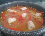 Foto del paso 3 de la receta: Arroz al horno con consomé de sobras de pavo asado