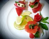 A picture of step 2 of Christmas apero with tomato and mozzarella cheese.