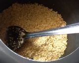 A picture of step 1 of Daliya Pulao.