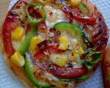A picture of step 4 of Mini pizza#recipemarathon#baking.