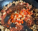 A picture of step 5 of Seafood Paella with Socarrat.
