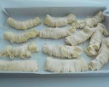 Foto del paso 14 de la receta: Gusanos de hojaldre rellenos de crema