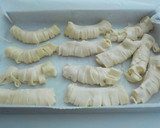 Foto del paso 14 de la receta: Gusanos de hojaldre rellenos de crema