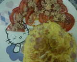 Foto del paso 3 de la receta: Tortilla de atún, jamón york y queso con tomate rajao