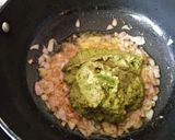 A picture of step 4 of Brinjal and capsicum in green gravy.