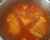 Foto del paso 7 de la receta: Bacalao con tomate, pimiento y patatas