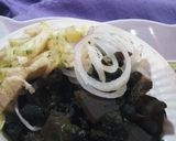 A picture of step 3 of Periwinkle (Piom Piom) and Kpomo Garnished with Garden Eggs.