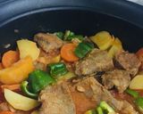 A picture of step 2 of Pork Loin Marinated in White Wine with Potatoes, Carrots, and Green Peppers!.