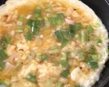 A picture of step 3 of Chessy green onion omelet.