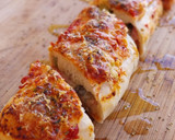 Foto del paso 11 de la receta: Rulo de pizza de jamón, quesos y olivas