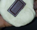A picture of step 4 of Chocolate stuffed buns.