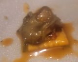 A picture of step 5 of Sweet Soy Spiced Oyster on White Cheddar Cracker.