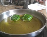 Foto del paso 4 de la receta: Milanesa de caçon con zanahoria envuelto en hoja de coliflor
