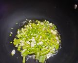 A picture of step 5 of Bajre ki khichdi (pearl millet khichdi).