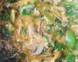 A picture of step 11 of Mushroom pulao.