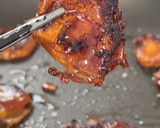 A picture of step 1 of Bitter leaf salad with charred dates and vinaigrette.