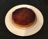 A picture of step 9 of Vanilla Layer Cake filled withLenon and Rasberry and frosted with Fresh Lemon Cream.