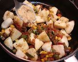 A picture of step 7 of Schezwan Masala Idli Fry.