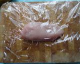 A picture of step 1 of Chicken Milanese.