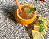 A picture of step 6 of Orange ice tea.