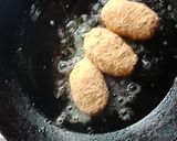 A picture of step 5 of Paneer hungcurd bullets.