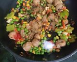 A picture of step 5 of Fried Black Rice.