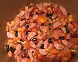 A picture of step 8 of Baked Beans with Smoked Sausages.
