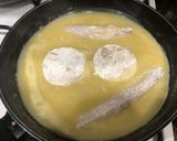 Foto del paso 7 de la receta Rape y merluza en salsa de ajo y vino blanco