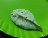 A picture of step 3 of Momo with keema filling.