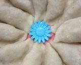 A picture of step 12 of Pitha (Bengali Coconut-Stuffed Pitha).
