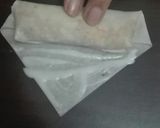 A picture of step 10 of Chicken Roll.