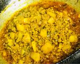 A picture of step 1 of Stir fried aloo keema.