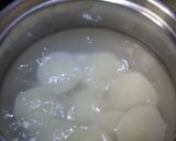 A picture of step 2 of Rasmali with rasgulla.