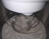A picture of step 10 of Strawberry milk cake with whipped cream frosting.