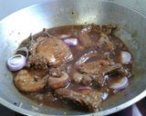 A picture of step 7 of Marinated pork chops on soy sauce (Bistek).