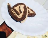 A picture of step 12 of Chocolate Swiss roll cake.