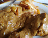 Foto del paso 7 de la receta: Jamoncitos de pollo a la naranja, clavo y apio