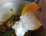 A picture of step 13 of Dahi wali bhindi.