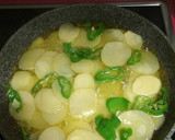 Foto del paso 2 de la receta: Lubina al horno con cama de patatas y brócoli al vapor
