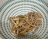 A picture of step 1 of Braised Pork Belly with Dried Daikon.