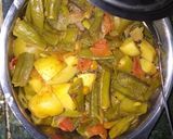 A picture of step 11 of Broad beans potato curry.