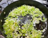 A picture of step 1 of Miso Butter Beans with leeks and spring greens (GF, VG).