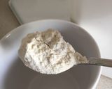 A picture of step 5 of Poached Cod with white sauce.