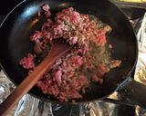 Foto del paso 2 de la receta: Salsa de tomates con carne molida
