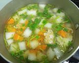 Hình bước làm 4 của món Canh củ cải cà rốt thịt băm