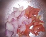 A picture of step 2 of Onian tomato carrot salad.